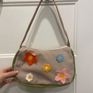 shoulder bad with crochet flowers